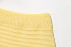 Conjunto em Tricô Vazado – Saia Mini + Camisa